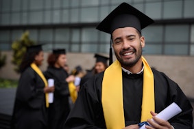 Young man at a postdoc graduation
