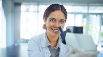 A female postdoc in a laboratory